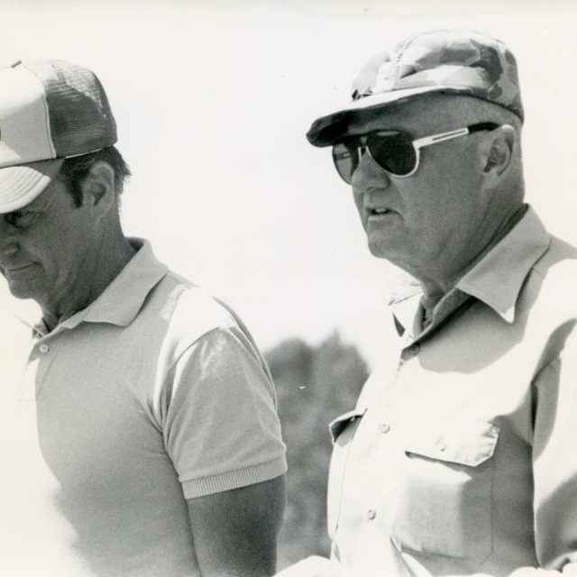 Jeff Cooper, president of the IPSC, chats to former world practical pistol champion, Ray Chapman, during the 1979 world shoot held in South Africa in September.