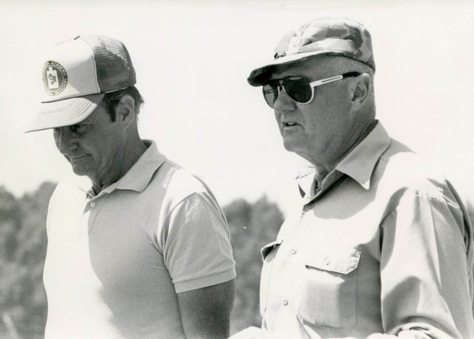 Jeff Cooper, president of the IPSC, chats to former world practical pistol champion, Ray Chapman, during the 1979 world shoot held in South Africa in September.