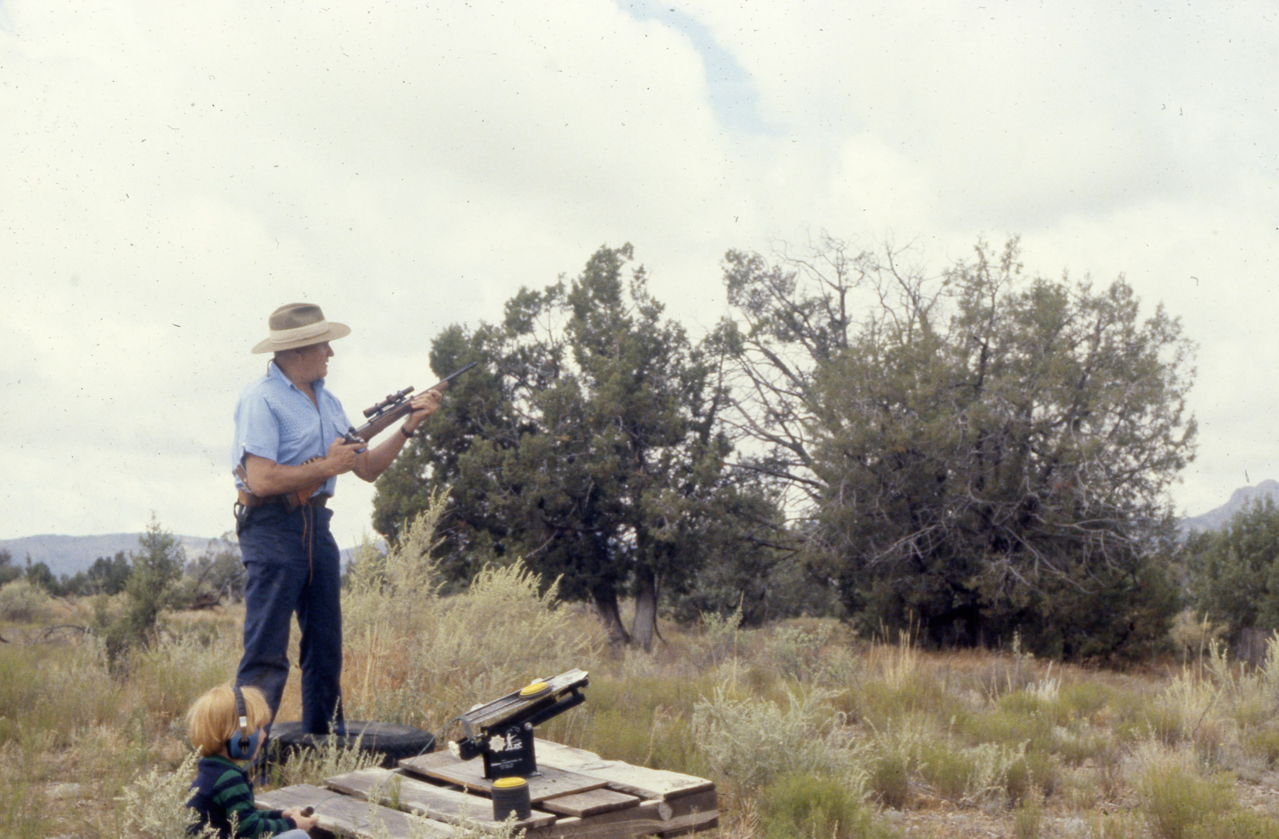 Shooting some clays with the granddaughter.  You might recognize the rifle as “Scout 1”- A .308 Remington 600 with a Leupold M8-2X.  As far as we know, nobody knows where this rifle is today.