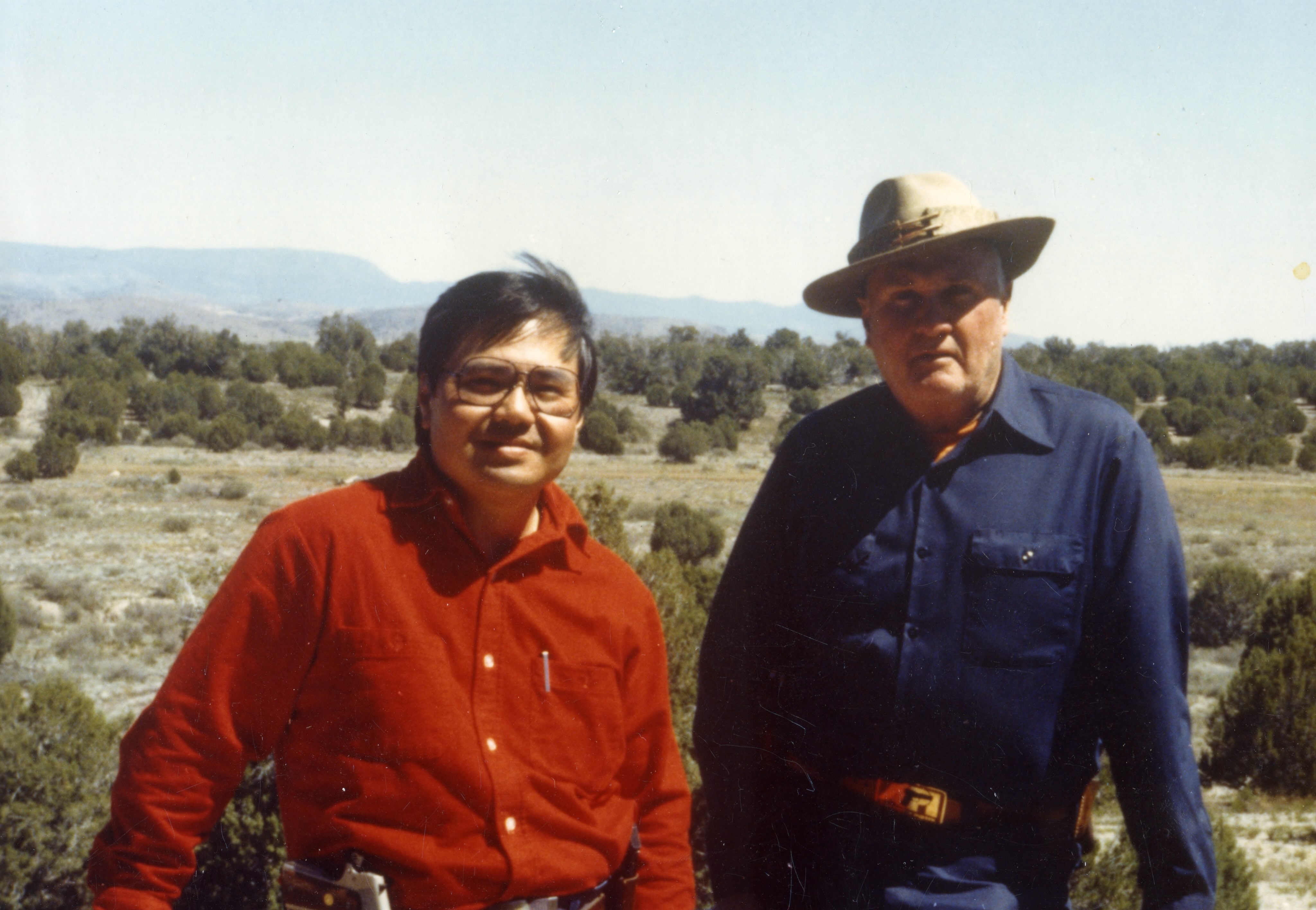 Jeff Cooper and Eric Ching, May 1986, While attending a rifle class at the American Pistol Institute (API, later Gunsite Academy) in Paulden, Arizona, under Jeff Cooper.

Eric Ching (1951–2007) took the rifle class that year, grew frustrated with the limitations of the then-standard CW/military-style shooting sling, and designed the three-point “Ching Sling” as a faster, more practical alternative. Jeff endorsed and adopted it for the scout rifle concept, naming it after him.

Eric was a Gunsite student and later a long-time Rangemaster/instructor.